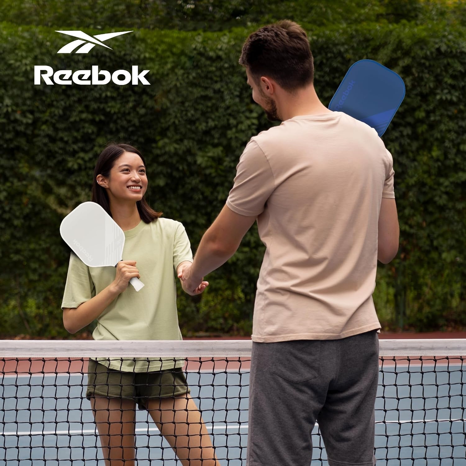 image:imageReebok Pickleball Set for 2 Players Includes 2 Paddles with Cushion Grip and 2 LightUp Balls Perfect for Night Play Durable Engineered for Sports EnthusiastsBlueWhite
