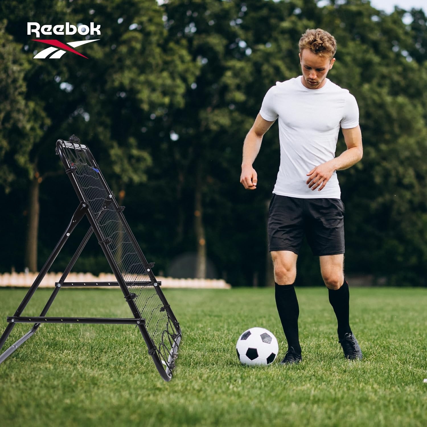 image:imageReebok Soccer Rebounder Portable Training Net for Practice Drills Portable Training Net Angled Rebound Surface Quick Setup Helps Practice Passing Shooting Ball Control and Reactions