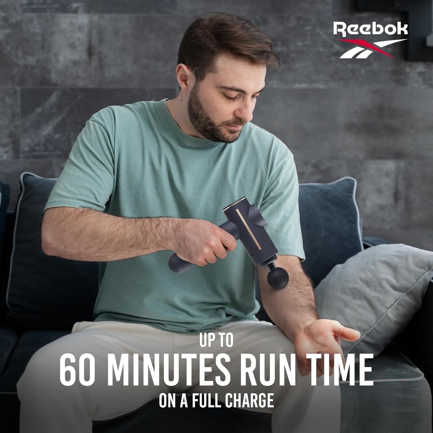 image:imageReebok Deep Tissue Massage Gun with Multiple Heads and Speed Settings 4 Attachments Cordless Operation Deep Tissue Relief Percussion Therapy Full Body Recovery