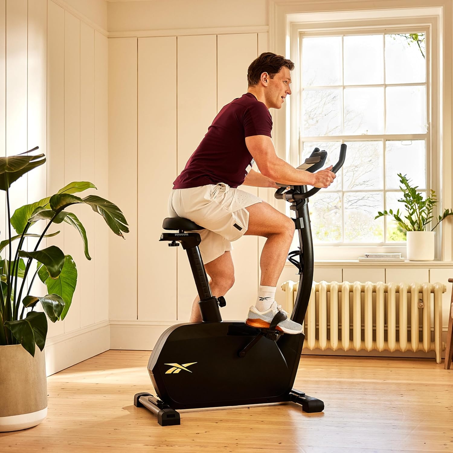 image:imageReebok FR20 Stationary Bike Indoor Cycling Bike with Adjustable Handles Saddle and Floor Level 8 Resistance Levels Upright Exercise Bike Black
