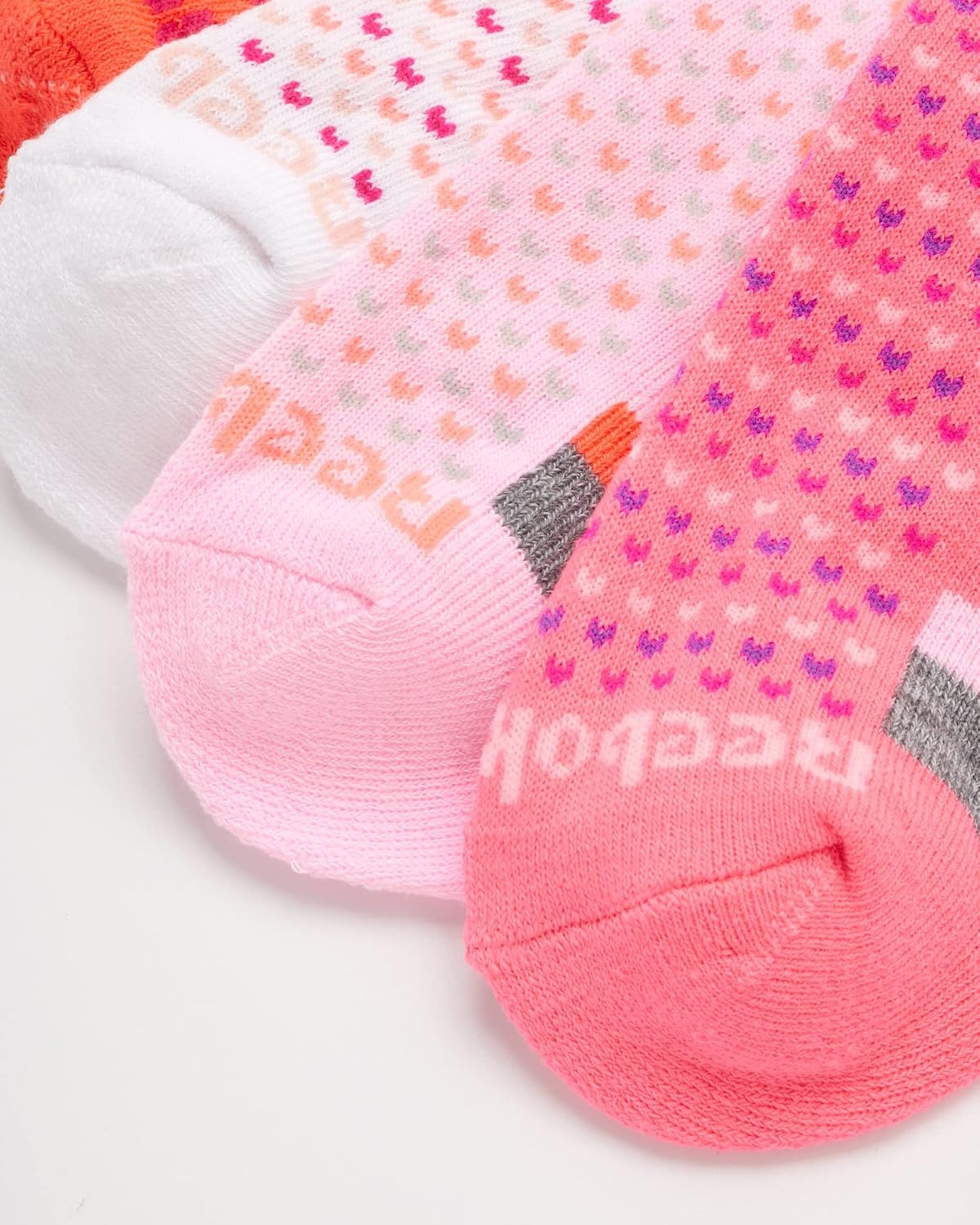 image:imageReebok Girls Quarter Socks 12 Pack Quarter Cut Arch Support Athletic Socks Stretchfit Knit Contours to Feet Moisturewicking Fabric Seamless Toe Closure Cushioned HeelPink Assorted