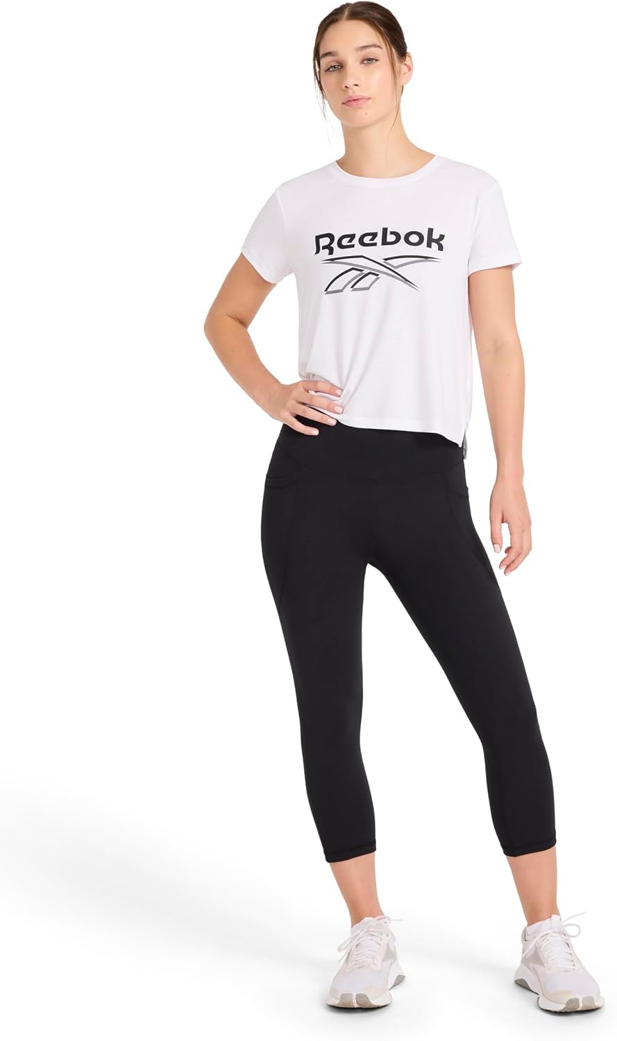 image:imageReebok Womens Id Train Capri Slim Fit 20 Inseam Lightweight Stretch Poly Motion Interlock Fabric MoistureWickingOriginal Black