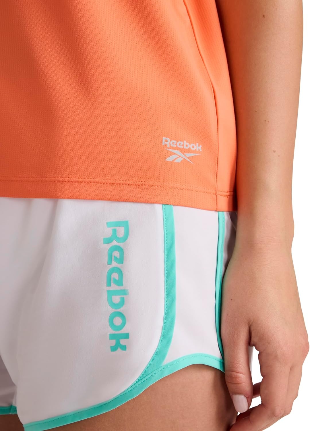image:imageReebok Womens Weightless Short Sleeve Mesh Crewneck TShirt Standard Fit Stretch Poly FabricPersimmon