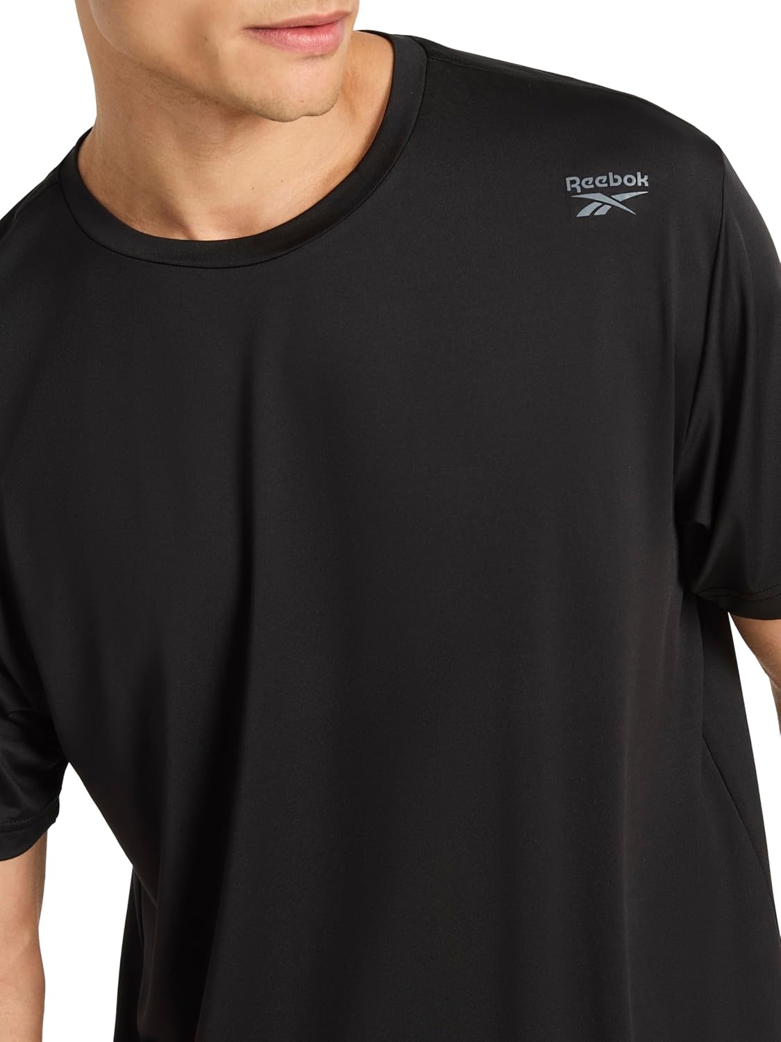 image:imageReebok Mens Reflective Small Logo Crewneck TShirt Standard Fit Lightweight Cool Touch Jersey FabricBlack Bolt Strike