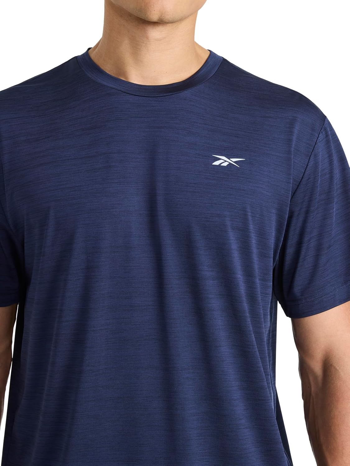 image:imageReebok Mens Reflective Small Logo Crewneck TShirt Standard Fit Lightweight Cool Touch Jersey FabricVector Navy Heather Lightning