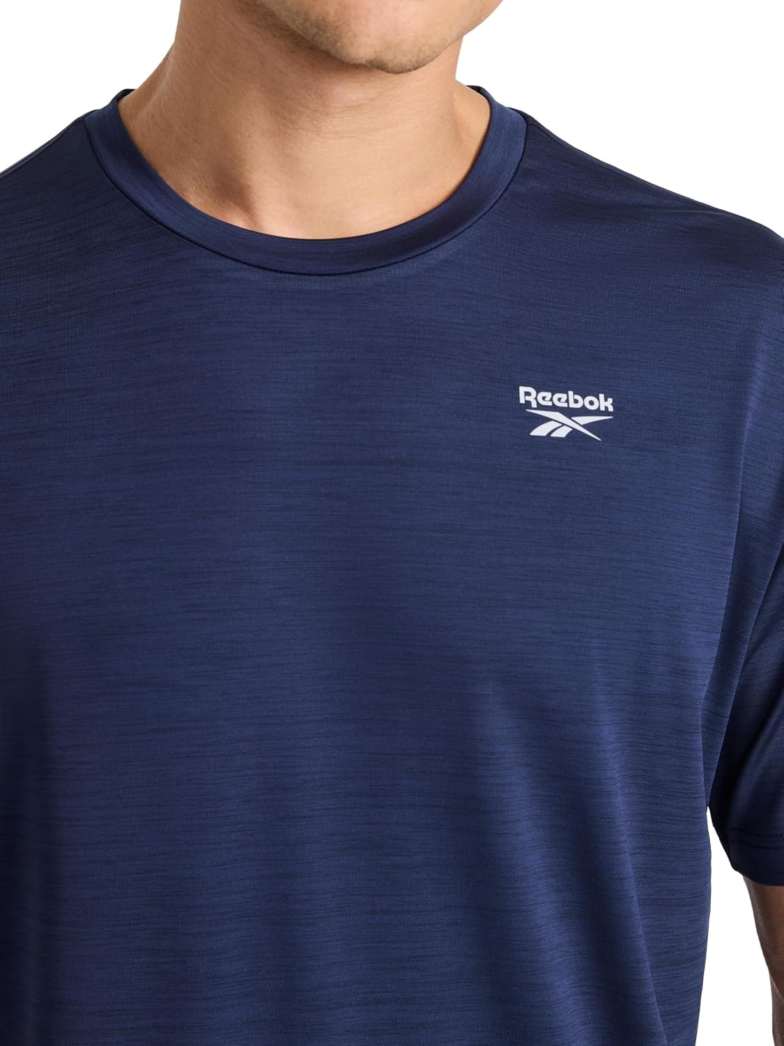image:imageReebok Mens Reflective Small Logo Crewneck TShirt Standard Fit Lightweight Cool Touch Jersey FabricVector Navy Heather Showdown