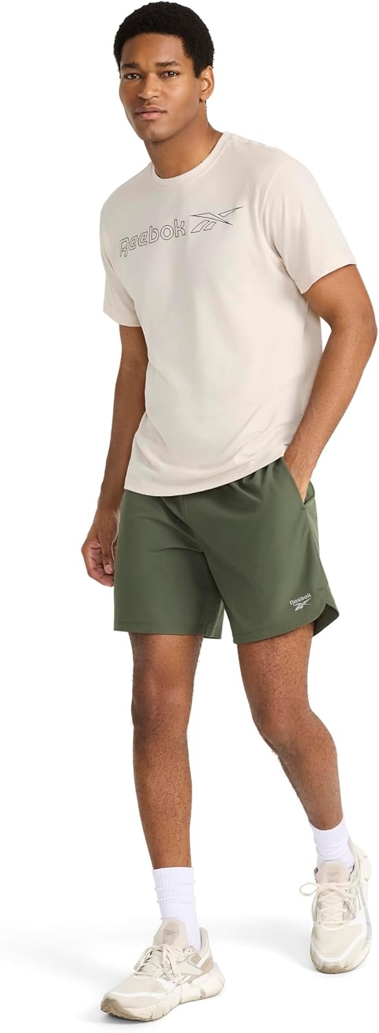 image:imageReebok Mens Short Sleeve Graphic Crewneck TShirt Standard Fit Lightweight CottonPoly FabricPumice Stone Outline