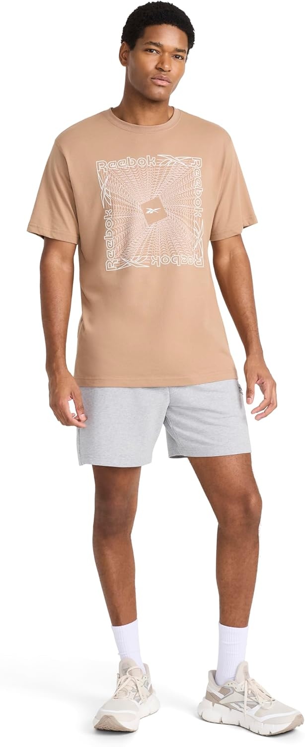 image:imageReebok Mens Short Sleeve Graphic Crewneck TShirt Standard Fit Lightweight CottonPoly FabricWoodsmoke Vortex