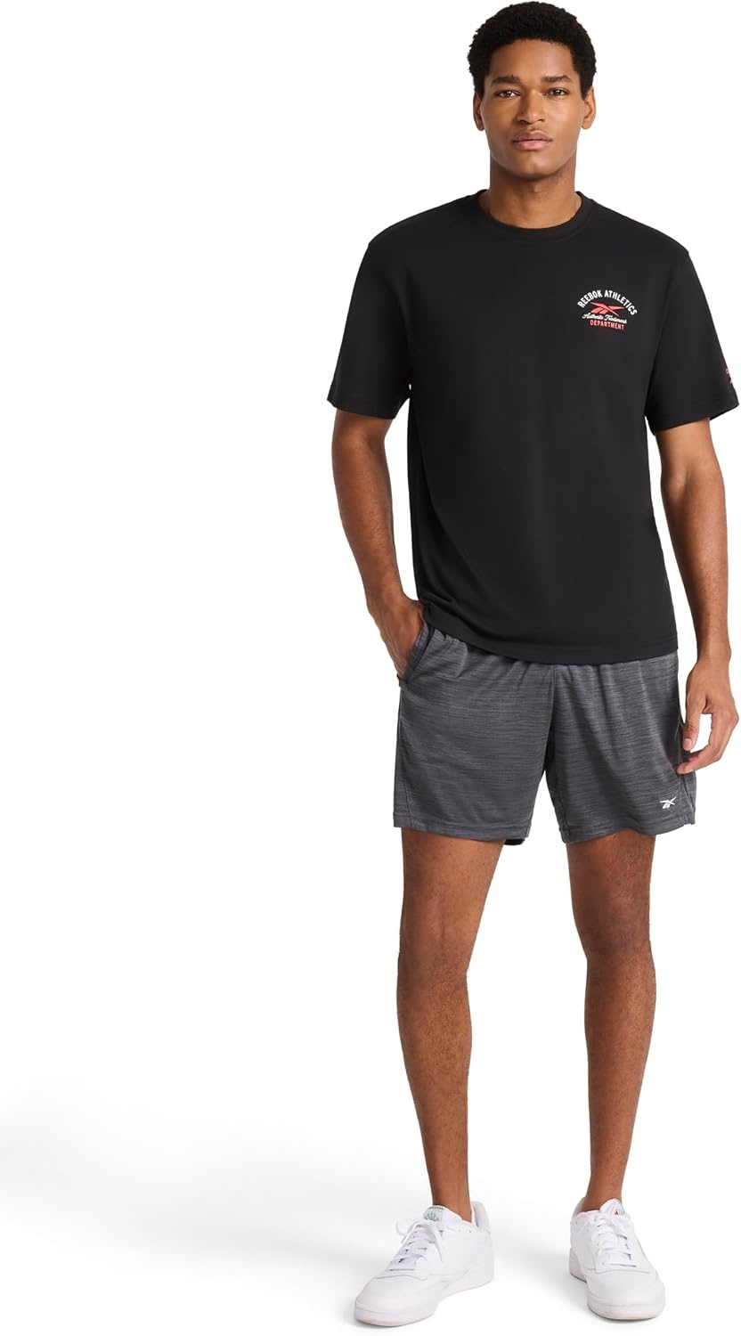 image:imageReebok Mens Small Logo Crewneck TShirt Standard Fit Lightweight CottonPoly Jersey FabricBlack Athletics Dept