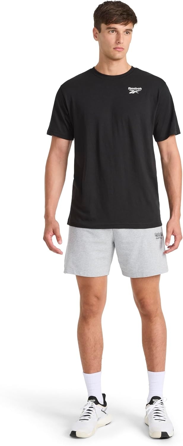 image:imageReebok Mens Small Logo Crewneck TShirt Standard Fit Lightweight CottonPoly Jersey FabricBlack Peak