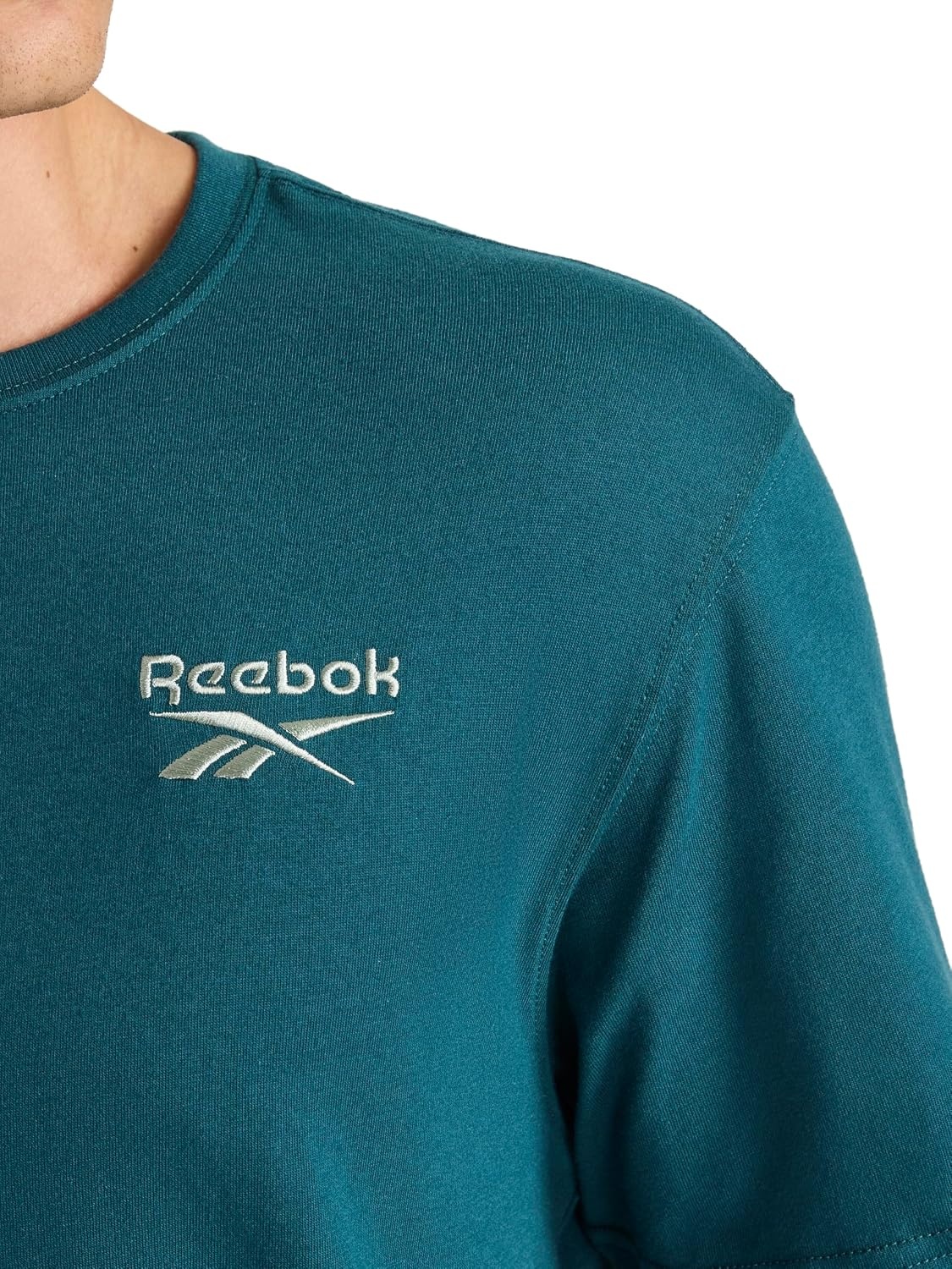 image:imageReebok Mens Small Logo Crewneck TShirt Standard Fit Lightweight CottonPoly Jersey FabricDeep Teal Small Embroidery