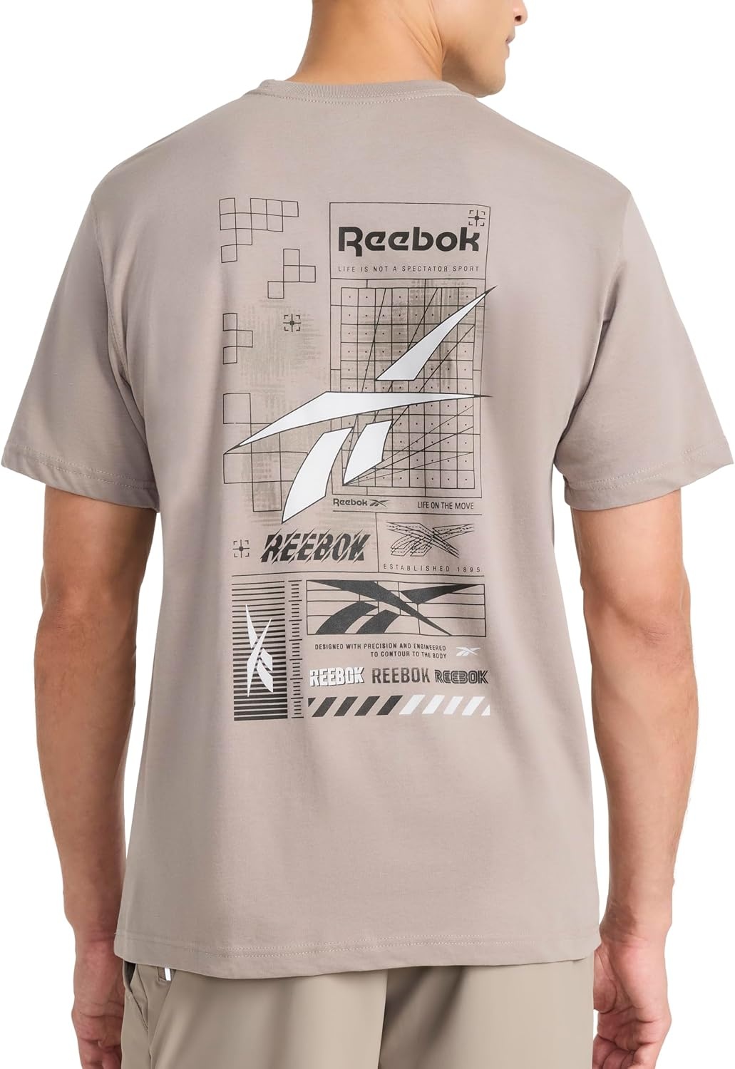 image:imageReebok Mens Small Logo Crewneck TShirt Standard Fit Lightweight CottonPoly Jersey FabricDriftwood Proto