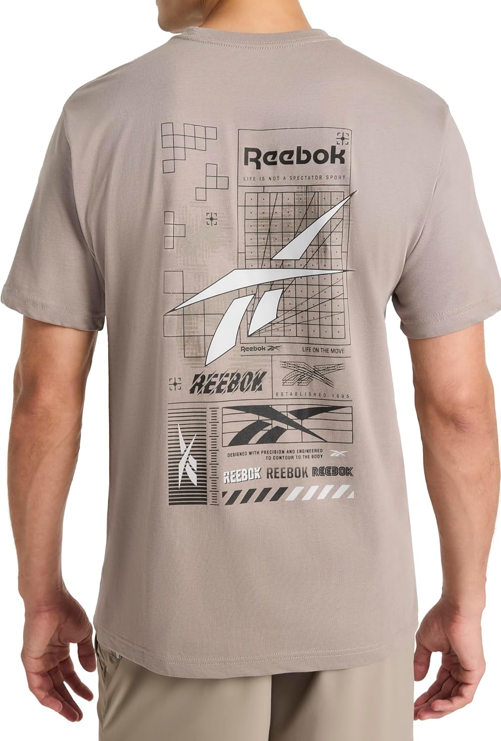 image:imageReebok Mens Small Logo Crewneck TShirt Standard Fit Lightweight CottonPoly Jersey FabricDriftwood Proto
