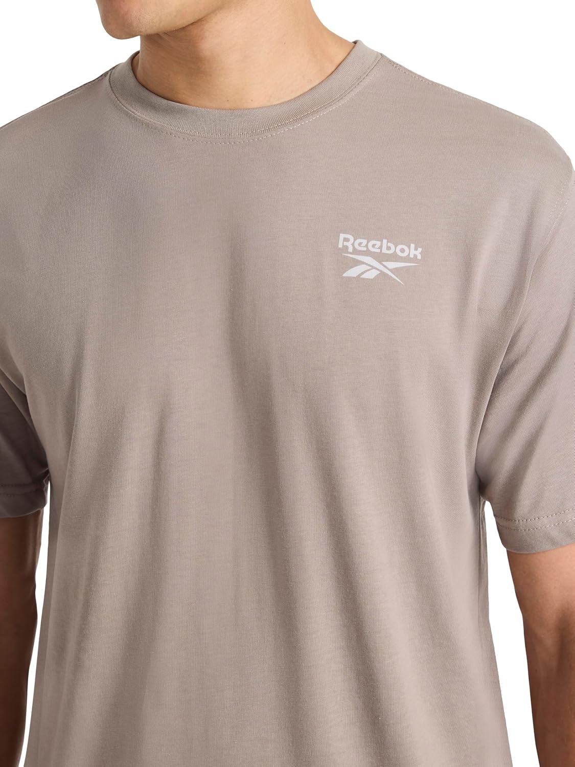 image:imageReebok Mens Small Logo Crewneck TShirt Standard Fit Lightweight CottonPoly Jersey FabricDriftwood Proto