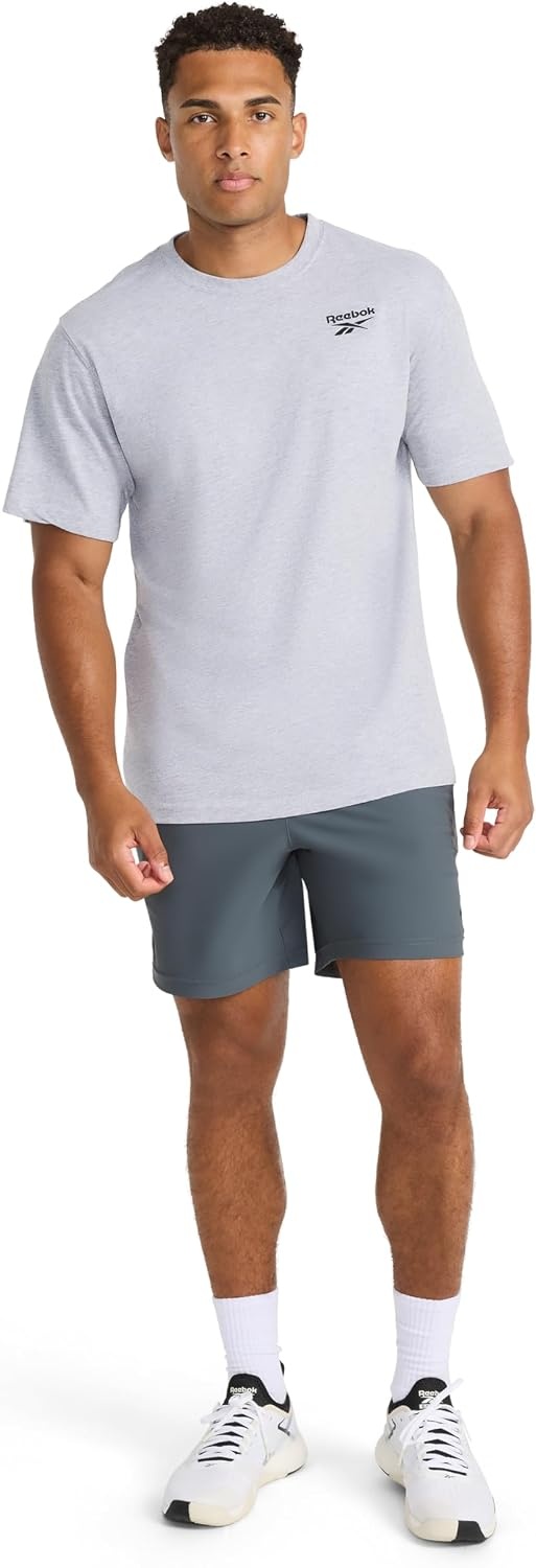 image:imageReebok Mens Small Logo Crewneck TShirt Standard Fit Lightweight CottonPoly Jersey FabricGrey Heather Expo