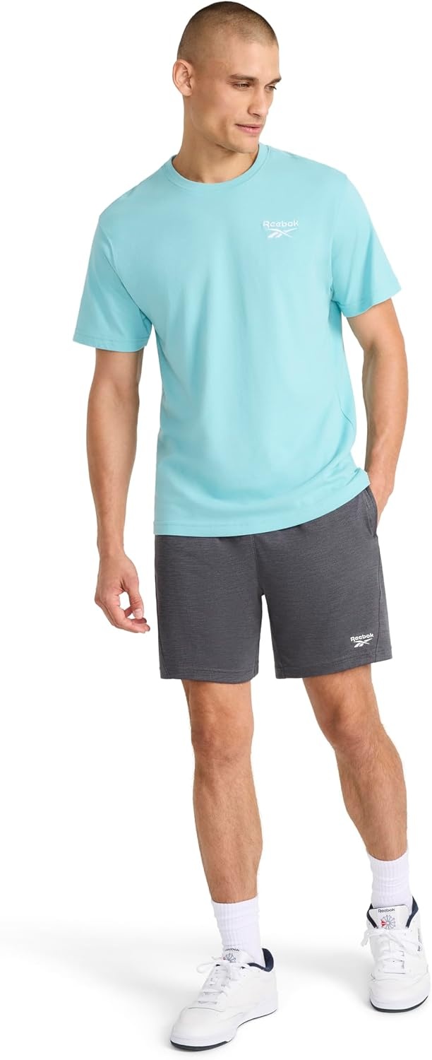 image:imageReebok Mens Small Logo Crewneck TShirt Standard Fit Lightweight CottonPoly Jersey FabricMarine Blue Small Embroidery