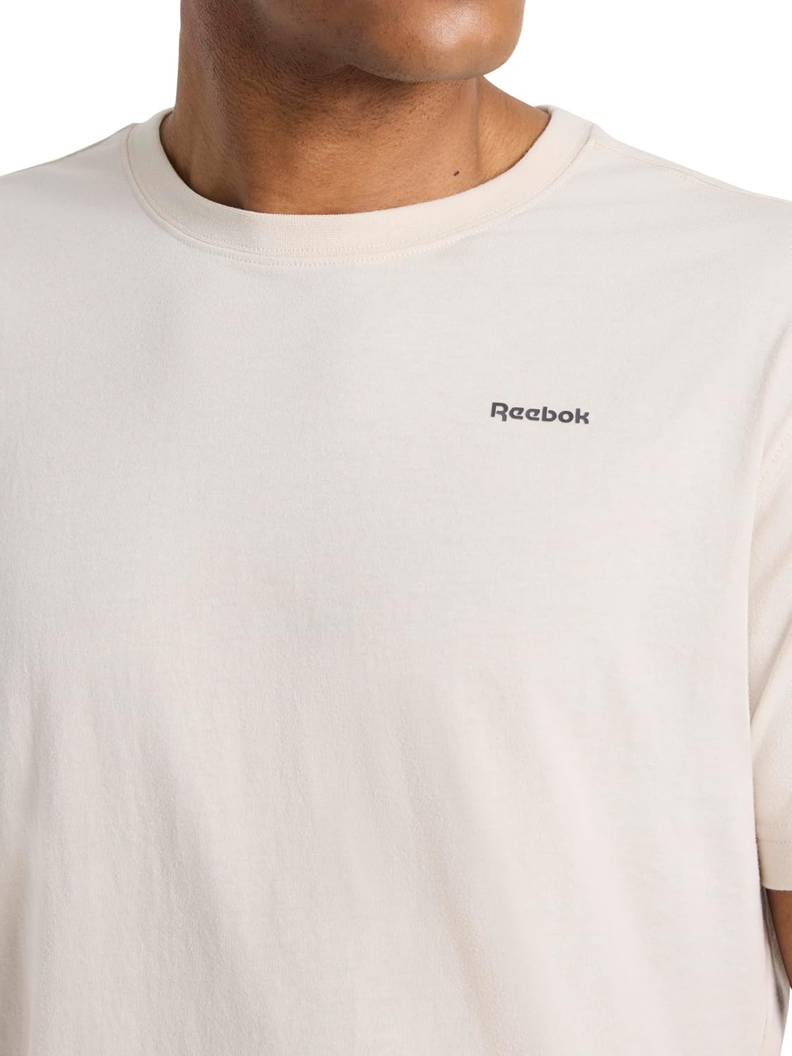 image:imageReebok Mens Small Logo Crewneck TShirt Standard Fit Lightweight CottonPoly Jersey FabricPumice Stone Schematic