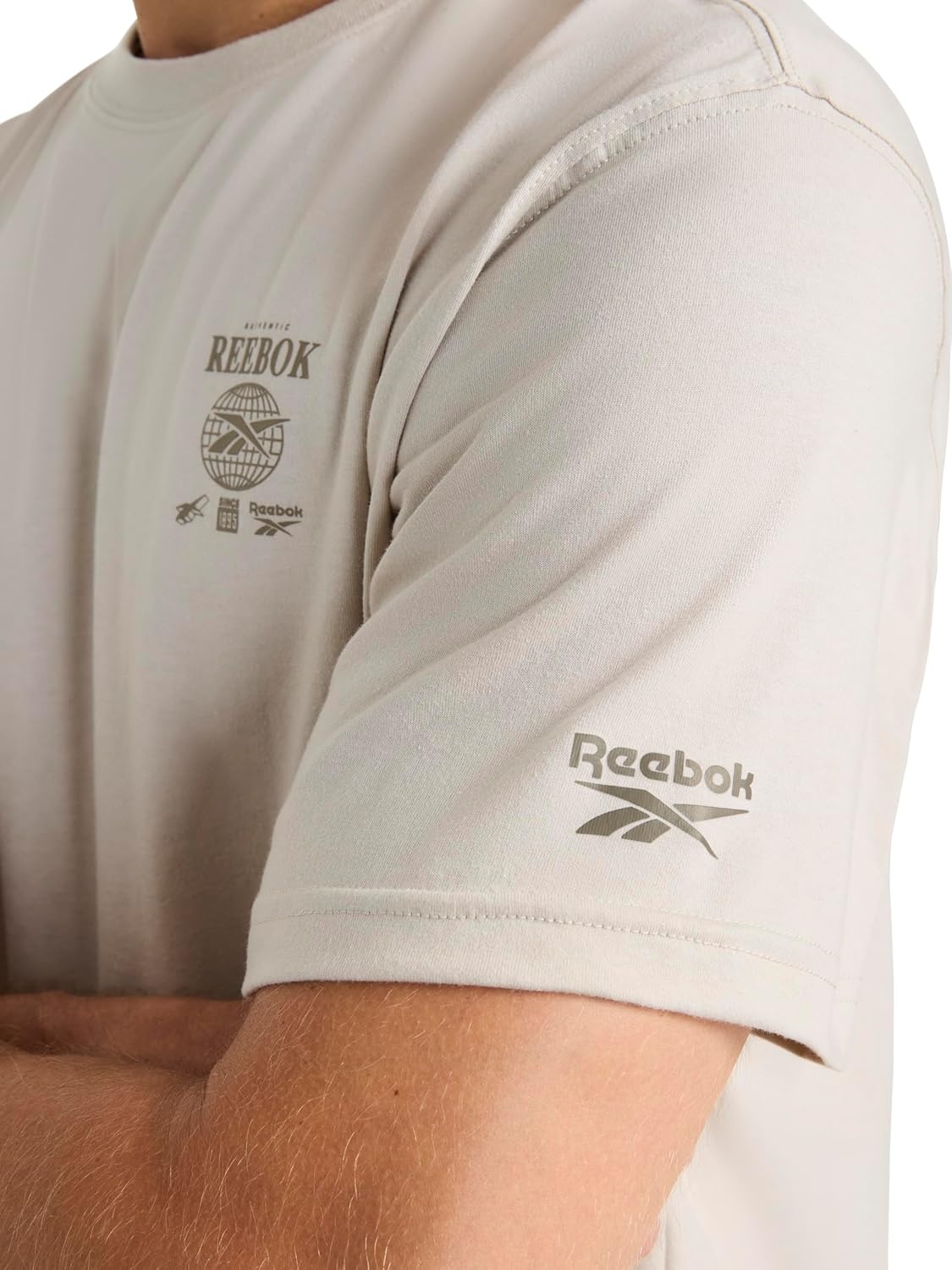 image:imageReebok Mens Small Logo Crewneck TShirt Standard Fit Lightweight CottonPoly Jersey FabricSilver Cloud Globe