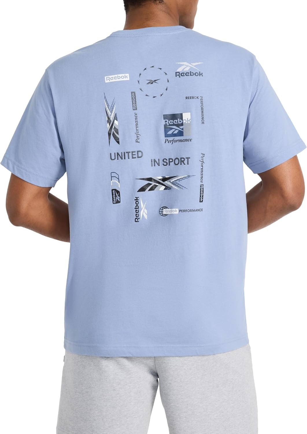 image:imageReebok Mens Small Logo Crewneck TShirt Standard Fit Lightweight CottonPoly Jersey FabricStonewash Bebop