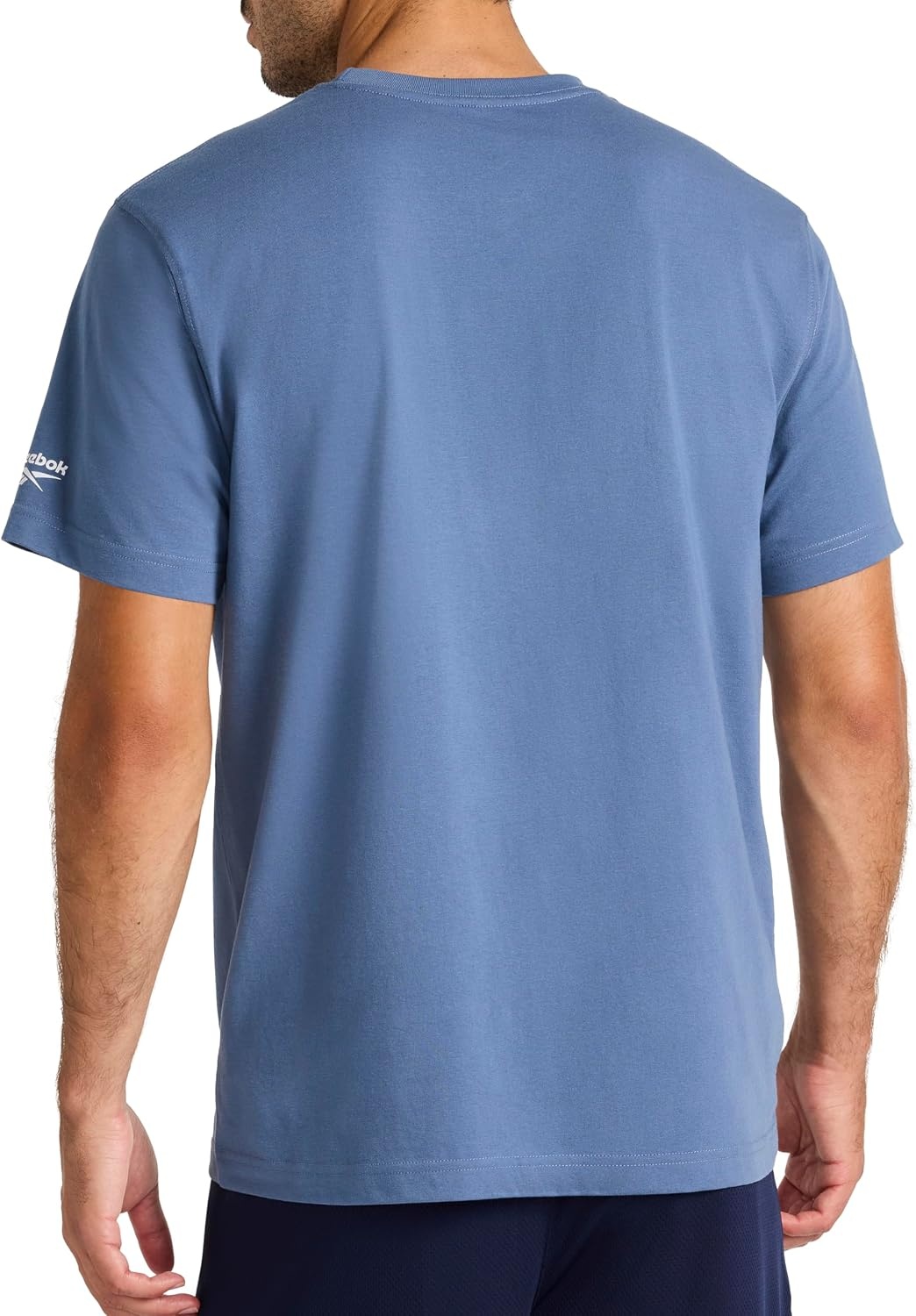image:imageReebok Mens Small Logo Crewneck TShirt Standard Fit Lightweight CottonPoly Jersey FabricVector Shadow Athletics Dept