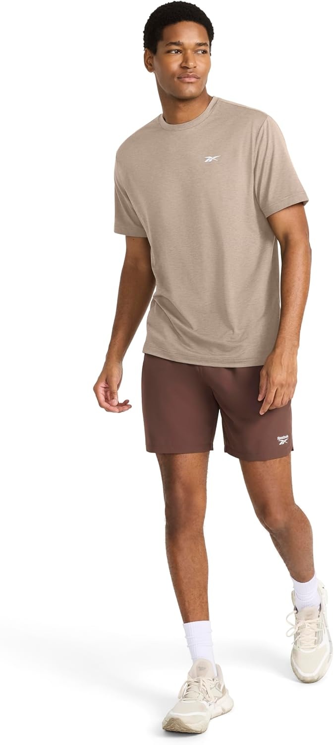 image:imageReebok Mens Strike Short Sleeve Crewneck TShirt Standard Fit Lightweight Stretch Poly Jersey FabricGritty Grey Heather