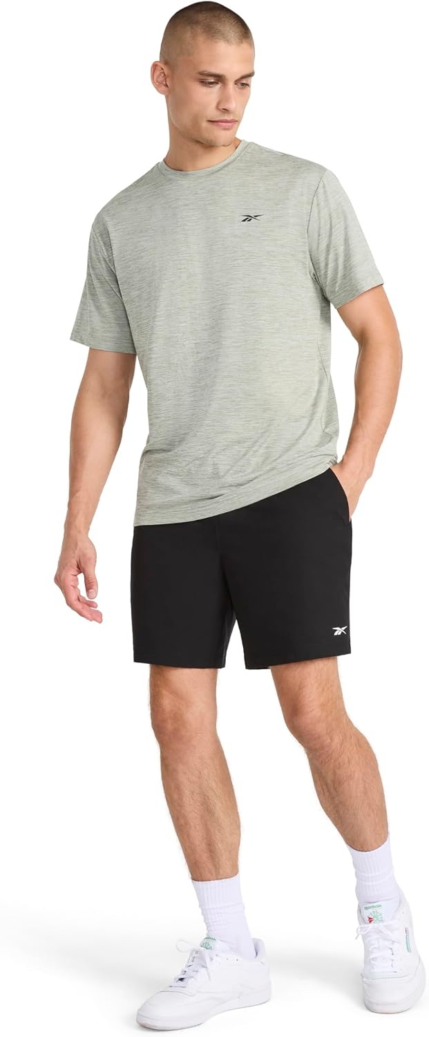 image:imageReebok Mens Strike Short Sleeve Crewneck TShirt Standard Fit Lightweight Stretch Poly Jersey FabricIceberg Green Heather
