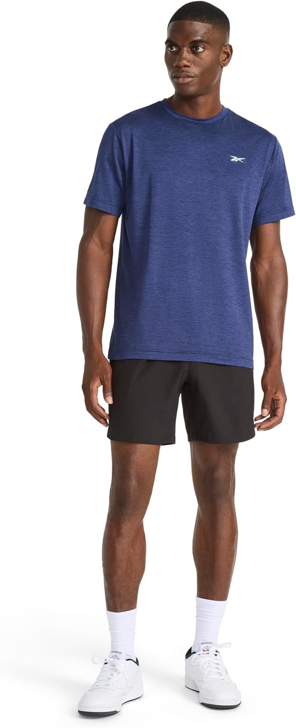 image:imageReebok Mens Strike Short Sleeve Crewneck TShirt Standard Fit Lightweight Stretch Poly Jersey FabricVector Navy Heather